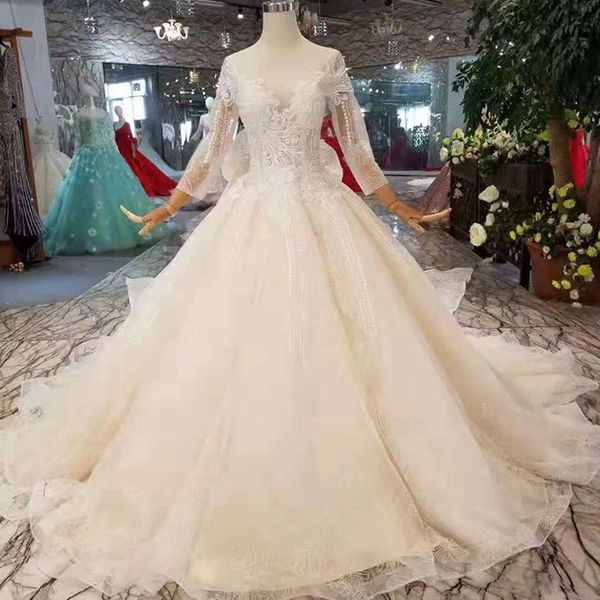 long sleeve wedding gowns detachable train big round neck sparkly wedding dresses champagne with remove train and big bow, White
long sleeve wedding gowns detachable train big round neck sparkly wedding dresses champagne with remove train and big bow, White