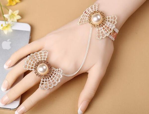 new lady bow with micro-set pearl lace bracelet with ring chain is fashionable and elegant, Golden;silver
new lady bow with micro-set pearl lace bracelet with ring chain is fashionable and elegant, Golden;silver