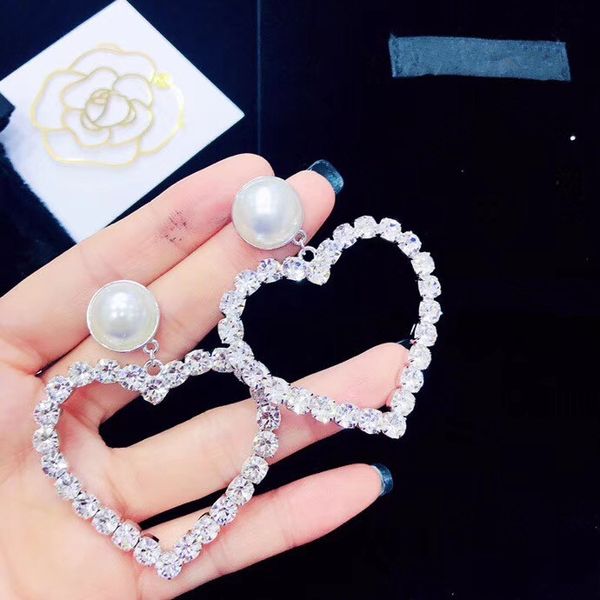 european fashion ladies big heart-shaped earrings fashion original to create pearl earrings counter with the same full diamond earrings, Golden
european fashion ladies big heart-shaped earrings fashion original to create pearl earrings counter with the same full diamond earrings, Golden