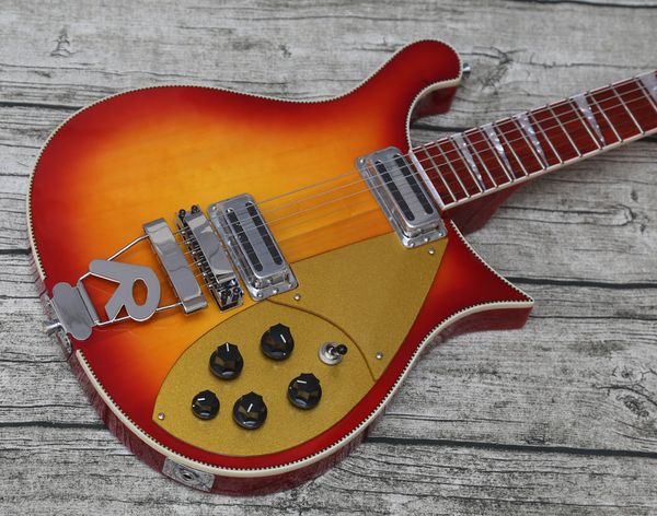 rare ric 660 6 strings red sunburst electric guitar neck thru body, gloss varnish red fingerboard, checkerboard binding, gold pickguard
rare ric 660 6 strings red sunburst electric guitar neck thru body, gloss varnish red fingerboard, checkerboard binding, gold pickguard
