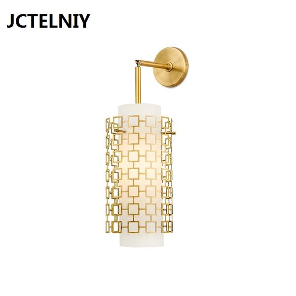 New Chinese wrought iron hollow designer hotel restaurant living room fashion glass wall lamp LED gold wall lamp
New Chinese wrought iron hollow designer hotel restaurant living room fashion glass wall lamp LED gold wall lamp