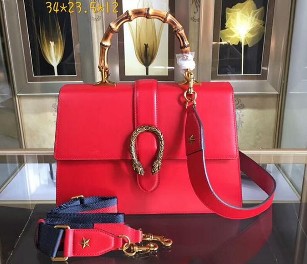 5a 421999 34cm dionysuss leather handle totes bag,tiger head spur,bamboo 10.5cm drop handle,come with dust bag
5a 421999 34cm dionysuss leather handle totes bag,tiger head spur,bamboo 10.5cm drop handle,come with dust bag