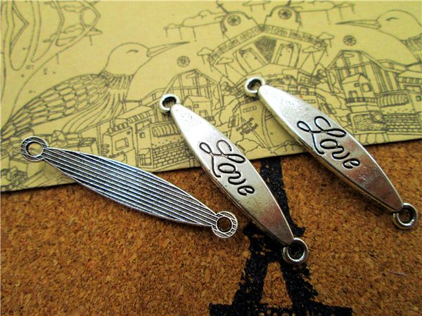 45pcs--love charms,antique tibetan silver love charm pendants,love connectors 7x41mm, Bronze;silver
45pcs--love charms,antique tibetan silver love charm pendants,love connectors 7x41mm, Bronze;silver