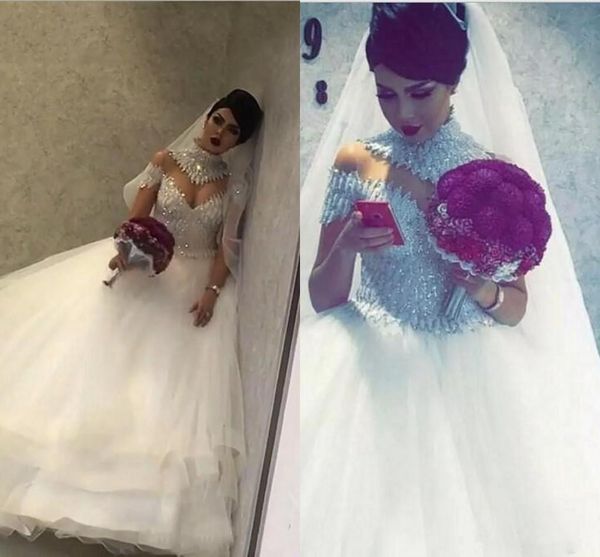 modest high neck wedding dresses arabic short sleeves lace appliqued beads bridal gowns sweep train vestidos de novia, White
modest high neck wedding dresses arabic short sleeves lace appliqued beads bridal gowns sweep train vestidos de novia, White