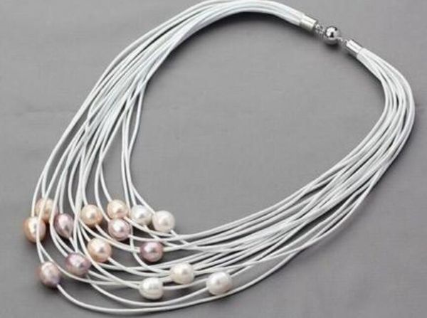 11-12mm white and pink freshwater pearl on multi-strand leather women necklace, Silver
11-12mm white and pink freshwater pearl on multi-strand leather women necklace, Silver