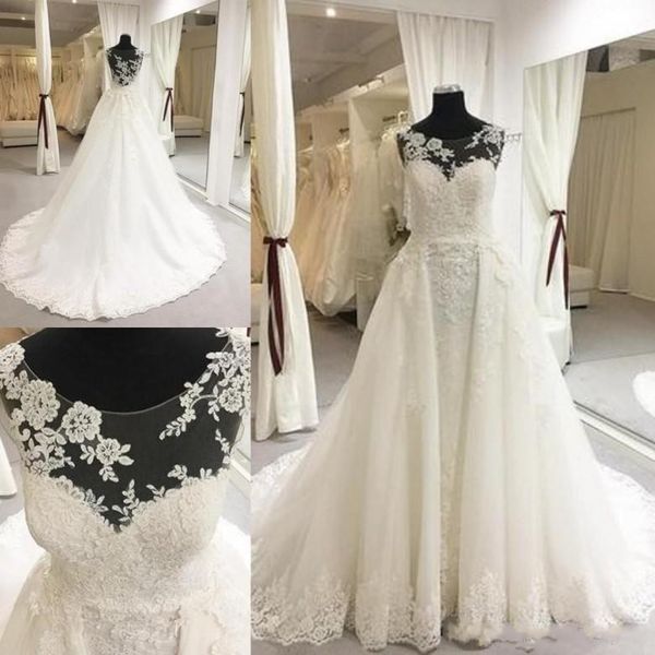 2019 принцесса кружева свадебные платья с overskirts суд поезд длинные строки свадебные свадебные платья выполненном на заказ, White
2019 принцесса кружева свадебные платья с overskirts суд поезд длинные строки свадебные свадебные платья выполненном на заказ, White