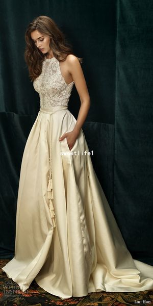 2019 lihi hod champagne ivory sleeveless wedding dresses halter neck lace bodice skirts pocket bridal gown custom made, White
2019 lihi hod champagne ivory sleeveless wedding dresses halter neck lace bodice skirts pocket bridal gown custom made, White