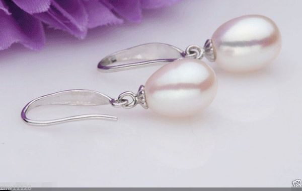genuine natural 7-8mm white freshwater cultured pearl dangle earrings>>> ing, Silver
genuine natural 7-8mm white freshwater cultured pearl dangle earrings>>> ing, Silver