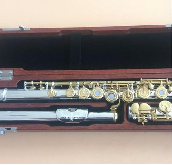 excellence 16 open hole flute c key silver plated body golden key great tone 
excellence 16 open hole flute c key silver plated body golden key great tone