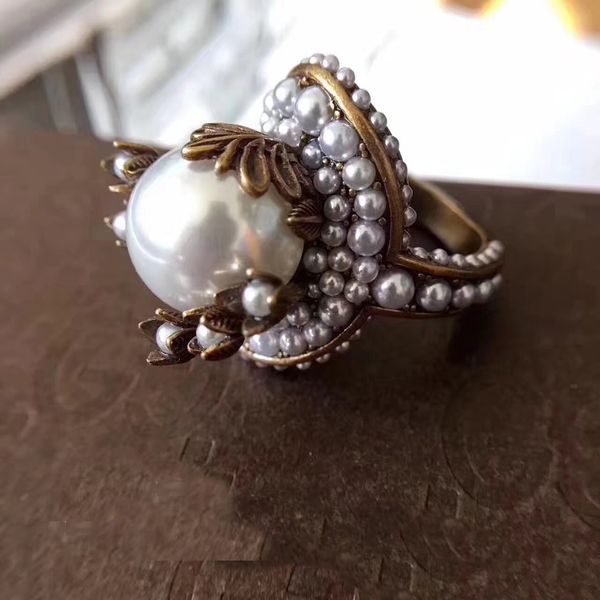 Vintage латуни роскошное кольцо с жемчужиной природы украшает очарование кольца юве
Vintage латуни роскошное кольцо с жемчужиной природы украшает очарование кольца юве