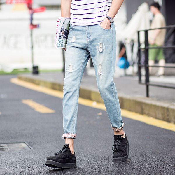 2018 designer men's ripped jeans pants slim fit light blue denim joggers male distressed destroyed trousers button pants
2018 designer men's ripped jeans pants slim fit light blue denim joggers male distressed destroyed trousers button pants