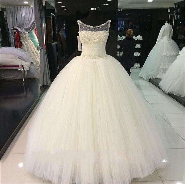 bling beaded ball gown wedding dresses plus size pearls crystal ivory ruched sheer tulle corset bridal gowns real images custom made, White
bling beaded ball gown wedding dresses plus size pearls crystal ivory ruched sheer tulle corset bridal gowns real images custom made, White