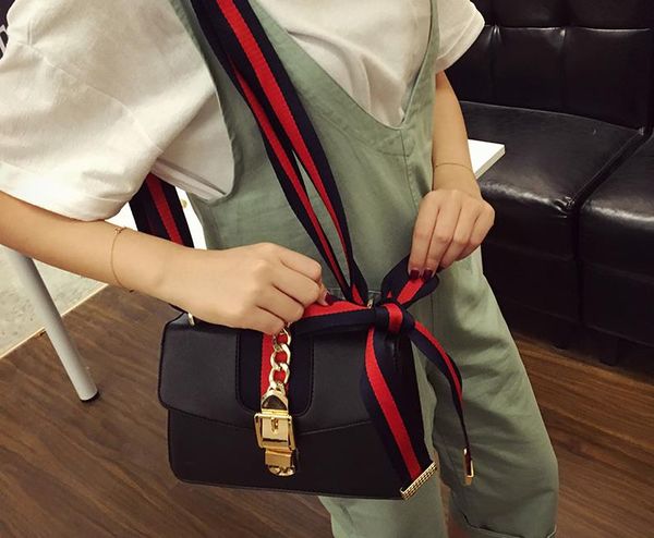 оптово новый замок женщины сумка высокого качества pu кожа женщин мешки посыльного вскользь crossbody сумка полосатой starp satchel болса fe
оптово новый замок женщины сумка высокого качества pu кожа женщин мешки посыльного вскользь crossbody сумка полосатой starp satchel болса fe