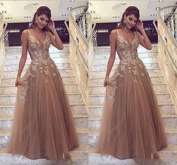 Modest Elegant Champagne Evening Dresses Spaghetti Deep V Neck Sleeveless Appliqued Tulle Formal Dresses A-line Prom Gowns
Modest Elegant Champagne Evening Dresses Spaghetti Deep V Neck Sleeveless Appliqued Tulle Formal Dresses A-line Prom Gowns