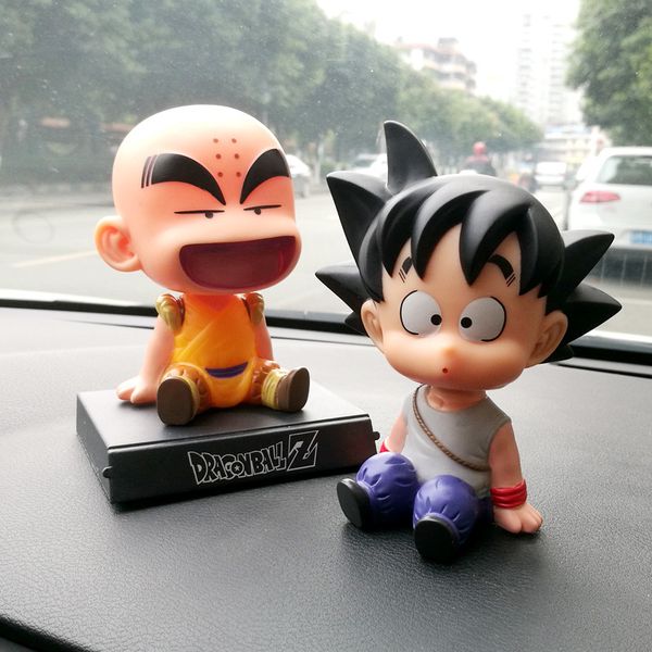 son goku monk car dashboard decoration toys phone holder mobile clip shake head styling dolls ornaments interior accessories
son goku monk car dashboard decoration toys phone holder mobile clip shake head styling dolls ornaments interior accessories