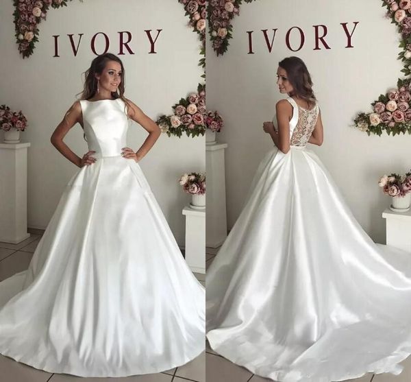 2018 beach a line wedding dresses bateau neck sleeveless sheer back crystal beaded satin court train plus size formal bridal gowns, White
2018 beach a line wedding dresses bateau neck sleeveless sheer back crystal beaded satin court train plus size formal bridal gowns, White