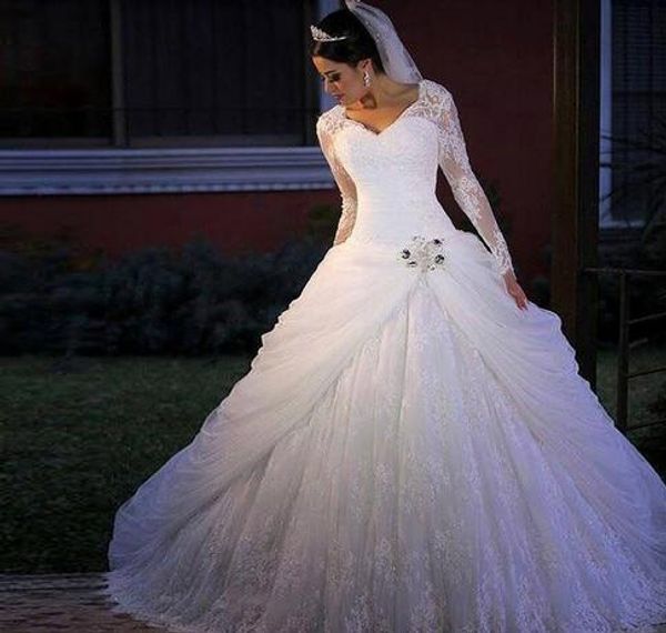 Luxury Ruffles Lace Ball Gown Wedding Dresses For Bride 2019 V Neck Illusion Long Sleeves Rhinestones Beaded Pleated Wedding Gowns Cheap
Luxury Ruffles Lace Ball Gown Wedding Dresses For Bride 2019 V Neck Illusion Long Sleeves Rhinestones Beaded Pleated Wedding Gowns Cheap