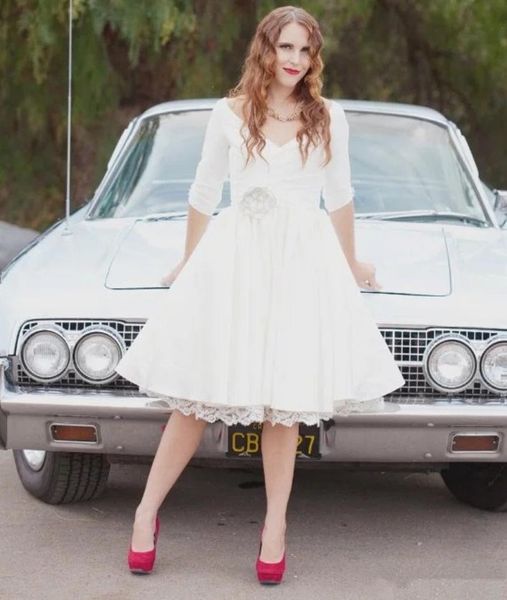 new lace belt v neck 1950s vintage knee length short wedding dresses half sleeve handmade flower pleated satin white a line bridal gown
new lace belt v neck 1950s vintage knee length short wedding dresses half sleeve handmade flower pleated satin white a line bridal gown