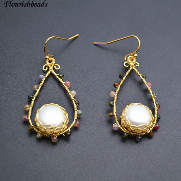 new design handmade wire wrapped natural white pearl and faceted tourmaline beads double layer drop shape earrings, Golden;silver
new design handmade wire wrapped natural white pearl and faceted tourmaline beads double layer drop shape earrings, Golden;silver