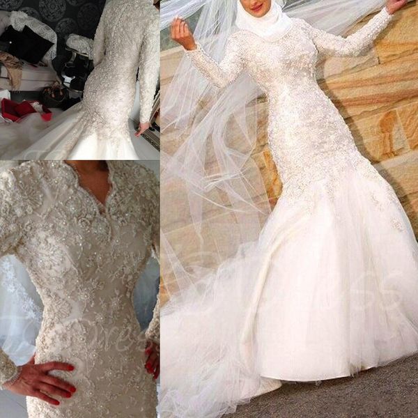 2018 мусульманин дубай бисером кружева с длинным рукавом русалка свадебные платья покрытые пуговицами винтаж плюс размер ближнего востока св, White
2018 мусульманин дубай бисером кружева с длинным рукавом русалка свадебные платья покрытые пуговицами винтаж плюс размер ближнего востока св, White