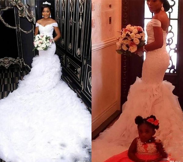 2018 Luxury White Mermaid Wedding Dress Off The Shoulder Lace Tiers Ruffles Long Church Garden Bride Bridal Gown Custom Made Plus Size
2018 Luxury White Mermaid Wedding Dress Off The Shoulder Lace Tiers Ruffles Long Church Garden Bride Bridal Gown Custom Made Plus Size
