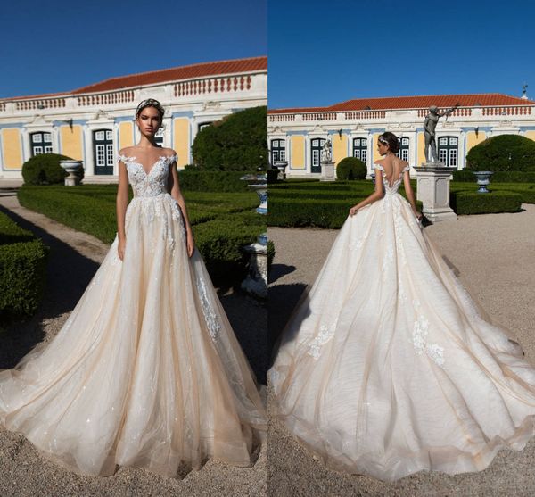 milla nova 2018 champagne elegant cap sleeves wedding dresses sheer neck a line tulle lace appliqued illusion back bridal gowns with buttons, White
milla nova 2018 champagne elegant cap sleeves wedding dresses sheer neck a line tulle lace appliqued illusion back bridal gowns with buttons, White