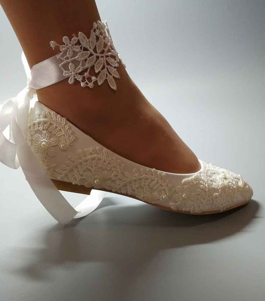 Женские белые свадебные туфли ручной работы на плоской подошве с балетными туфля
Женские белые свадебные туфли ручной работы на плоской подошве с балетными туфля