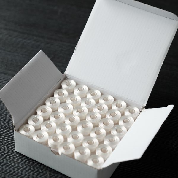 144pcs white color plastic sided l size prewound bobbin thread machine embroidery thread, Black;white
144pcs white color plastic sided l size prewound bobbin thread machine embroidery thread, Black;white