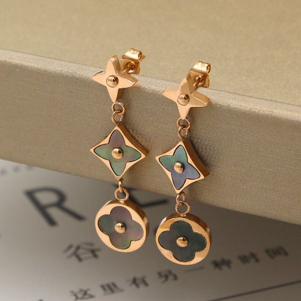 Модный женский цветок оболочки earnail, роскошный жемчуг мать оболочки титана стали
Модный женский цветок оболочки earnail, роскошный жемчуг мать оболочки титана стали