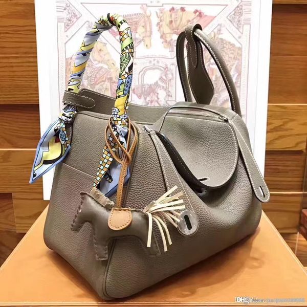 Cla ic h cowhide lind women genuine calf kin leather 30cm me enger handbag houlder bag tote pur e h togo real leather
Cla ic h cowhide lind women genuine calf kin leather 30cm me enger handbag houlder bag tote pur e h togo real leather