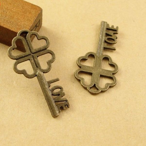 500 pcs antique bronze clover flower key charm pendants with love 26*13mm good for diy craft, Bronze;silver
500 pcs antique bronze clover flower key charm pendants with love 26*13mm good for diy craft, Bronze;silver