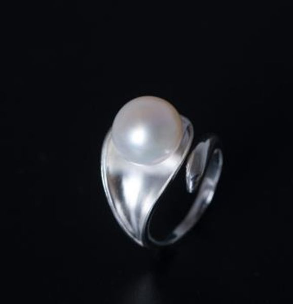 s925 silver european and american fashion simple suit with pearl opening adjustable ring
s925 silver european and american fashion simple suit with pearl opening adjustable ring