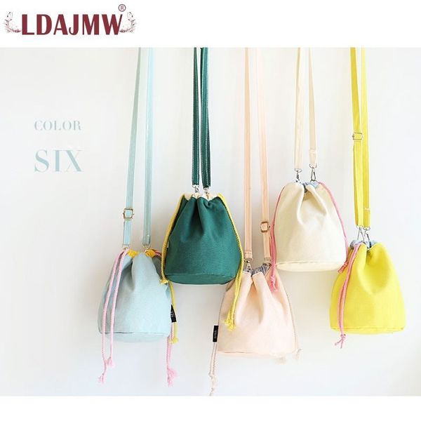new japan and south korea elegant solid color ladies shoulder bucket bag light and durable travel change lunch box bag
new japan and south korea elegant solid color ladies shoulder bucket bag light and durable travel change lunch box bag