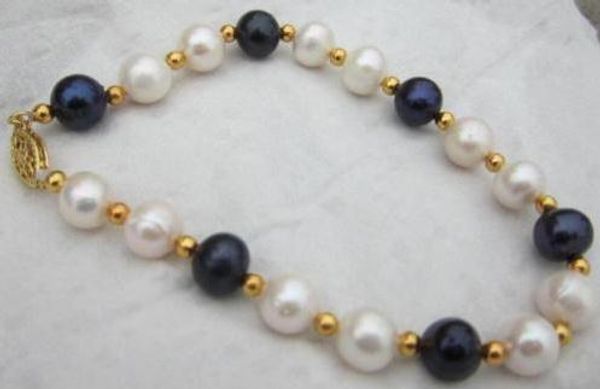 beautiful 8-9mm south sea white black pearl bracelet 7.5-8" 14k yellow golden cl
beautiful 8-9mm south sea white black pearl bracelet 7.5-8" 14k yellow golden cl