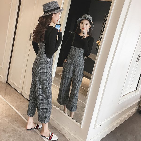 2018 spring and autumn korean loose woolen plaid overalls wide leg female college wind suit pants nine points siamese, Black;white
2018 spring and autumn korean loose woolen plaid overalls wide leg female college wind suit pants nine points siamese, Black;white