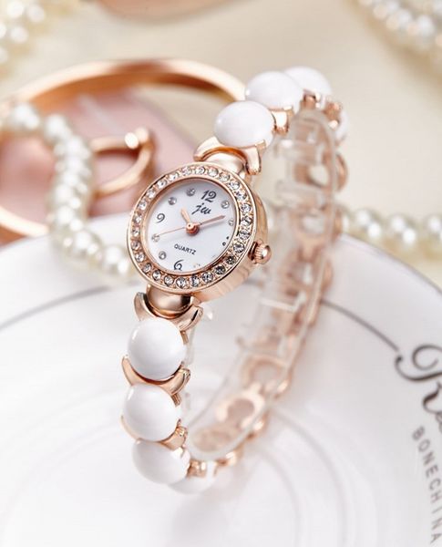 fashion simulated pearl strap watch women rhinestone small dial bracelet watch quartz wrist clock, Slivery;brown
fashion simulated pearl strap watch women rhinestone small dial bracelet watch quartz wrist clock, Slivery;brown