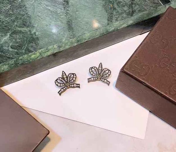 New arrival stud earring with vintage butterfly knot shape brass material and pearl bead Earring 18k gold plated S925 silver pin for earring
New arrival stud earring with vintage butterfly knot shape brass material and pearl bead Earring 18k gold plated S925 silver pin for earring
