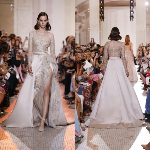 элегантный eliesaab 2019 выпускного вечера платья sheer шеи с длинным рукавом блестками кристалл вечерние платья бедра щели взлетно-посадочн, Black
элегантный eliesaab 2019 выпускного вечера платья sheer шеи с длинным рукавом блестками кристалл вечерние платья бедра щели взлетно-посадочн, Black
