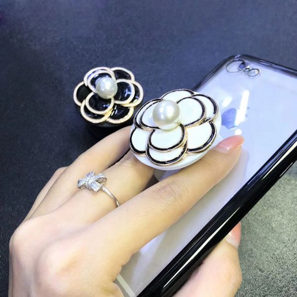 Универсальный Camellia Finger Holder Grip Расширяемый Расширяющийся Держатель для Мобильног
Универсальный Camellia Finger Holder Grip Расширяемый Расширяющийся Держатель для Мобильног