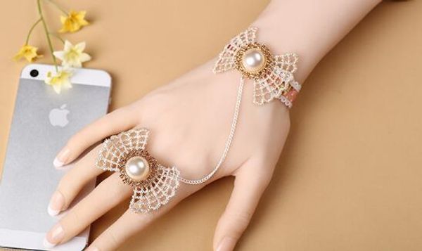 new lady bow with micro-set pearl lace bracelet with ring chain is fashionable and elegant, Golden;silver
new lady bow with micro-set pearl lace bracelet with ring chain is fashionable and elegant, Golden;silver