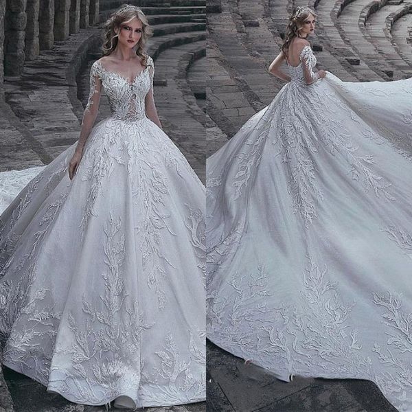 2019 luxurious long sleeve sheer neck ruffle applique lace wedding dresses hollow zipper back long tail bridal gown ship, White
2019 luxurious long sleeve sheer neck ruffle applique lace wedding dresses hollow zipper back long tail bridal gown ship, White