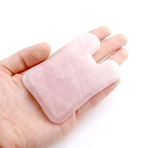Pink ro e quartz jade tone face ma ager gua ha board acupuncture gua ha craping ma age tool for no e finger beauty health 
Pink ro e quartz jade tone face ma ager gua ha board acupuncture gua ha craping ma age tool for no e finger beauty health