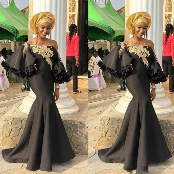 Dubai Black Prom Dresses 2019 Spring Summer Mermaid Evening Gowns With Gold Appliques Poet Sleeves Saudi Arabia Women Formal Wear
Dubai Black Prom Dresses 2019 Spring Summer Mermaid Evening Gowns With Gold Appliques Poet Sleeves Saudi Arabia Women Formal Wear