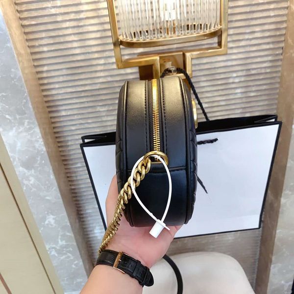 the new ladies bucket bags woman heart-shaped small circular chain one shoulder his genuine leather handbag purses a designer shoulder bag
the new ladies bucket bags woman heart-shaped small circular chain one shoulder his genuine leather handbag purses a designer shoulder bag
