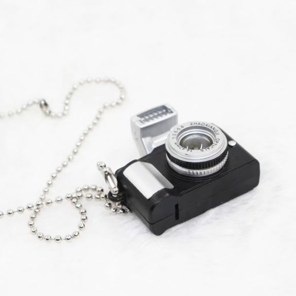 glowing vocal camera necklace sweater chain mini slr small camera pendant retro hip hop men women couple pendant party supplies zza1887, Silver
glowing vocal camera necklace sweater chain mini slr small camera pendant retro hip hop men women couple pendant party supplies zza1887, Silver