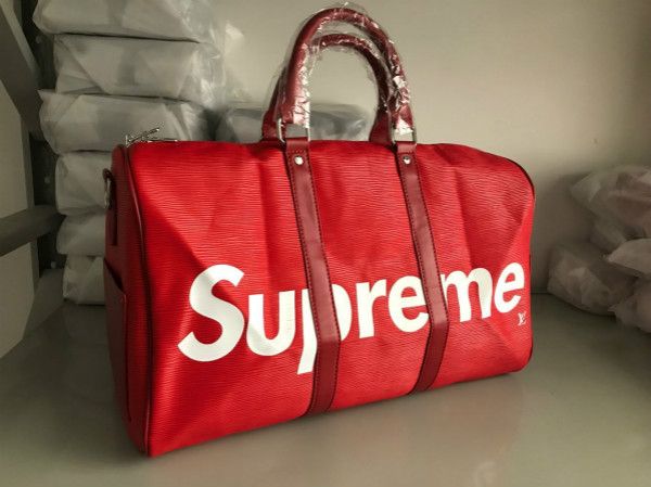 2018 red new fa hion men women travel bag duffle bag leather luggage handbag large capacity port bag 45cm 41418
2018 red new fa hion men women travel bag duffle bag leather luggage handbag large capacity port bag 45cm 41418