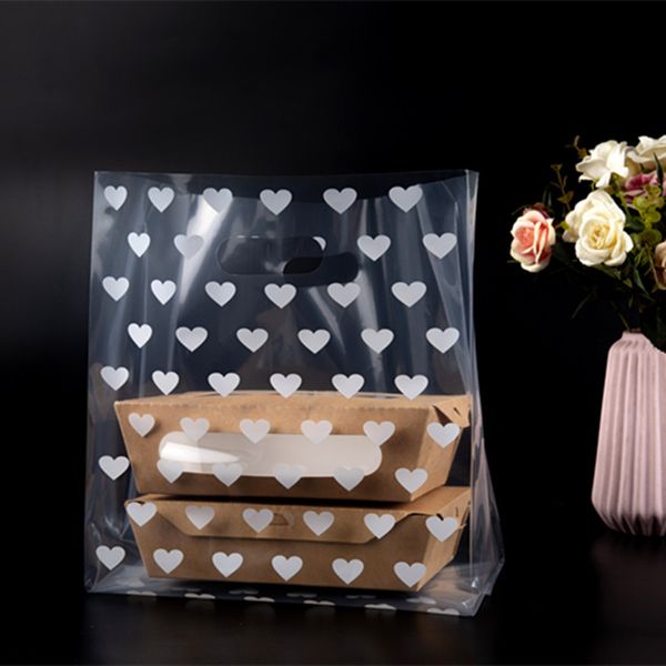 50pcs/lot heart shape printing plastic gift bags plastic shopping bags with handle party favor candy cake wrapping bag
50pcs/lot heart shape printing plastic gift bags plastic shopping bags with handle party favor candy cake wrapping bag