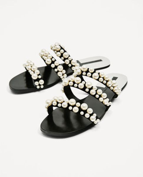 european and american women's shoes summer new line shape fine belt suede beaded sandals metal beach flat slippers, Black
european and american women's shoes summer new line shape fine belt suede beaded sandals metal beach flat slippers, Black