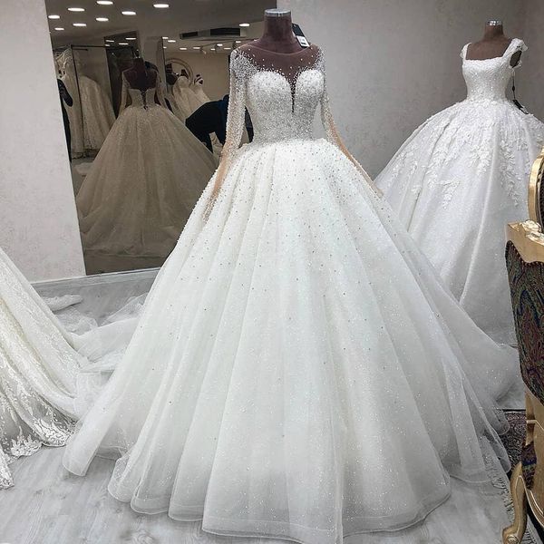 arabic aso ebi muslim beaded crystals wedding dresses sheer neck long sleeves bridal dresses tulle gorgeous wedding gowns, White
arabic aso ebi muslim beaded crystals wedding dresses sheer neck long sleeves bridal dresses tulle gorgeous wedding gowns, White