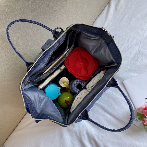 new style diaper bag multi-functional large-volume children mom and baby backpack wearable nylon lightweight luggage
new style diaper bag multi-functional large-volume children mom and baby backpack wearable nylon lightweight luggage
